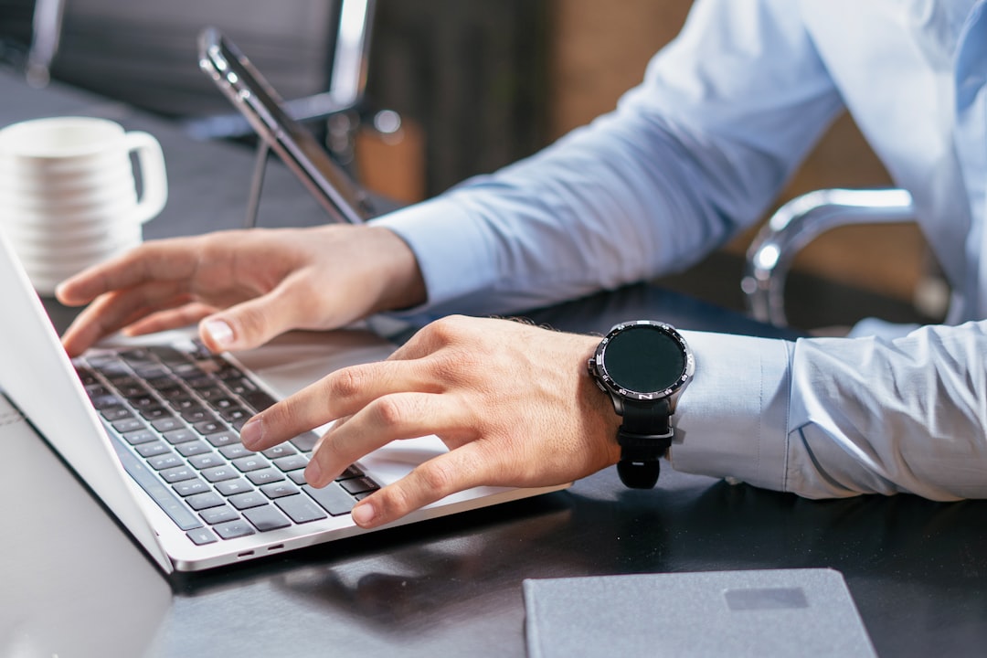 A minimalist desk setup with a time tracking software dashboard showing the 35-hour rule applied to freelance pricing